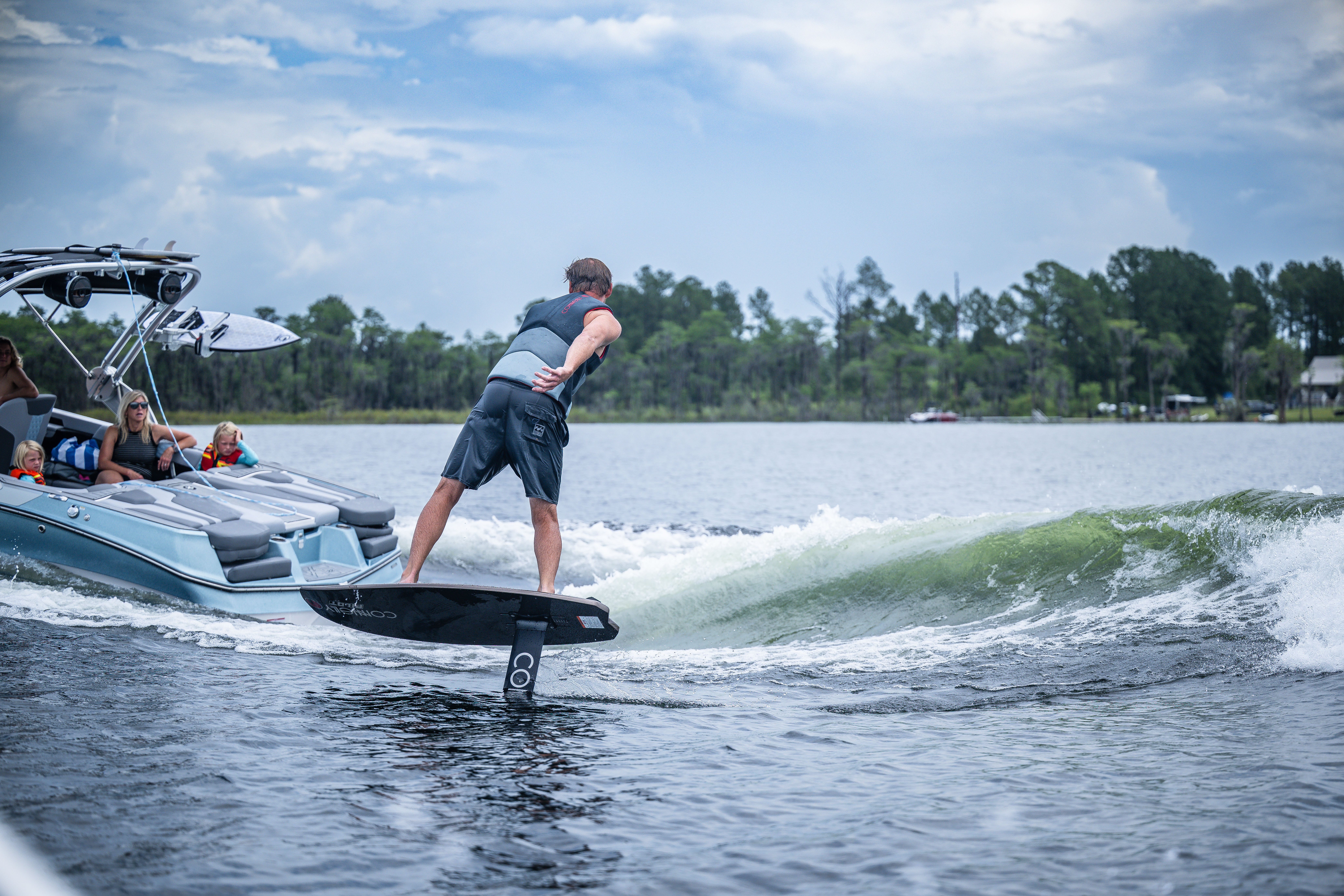 Rider gliding above the water on the Connelly Pilot wakefoil